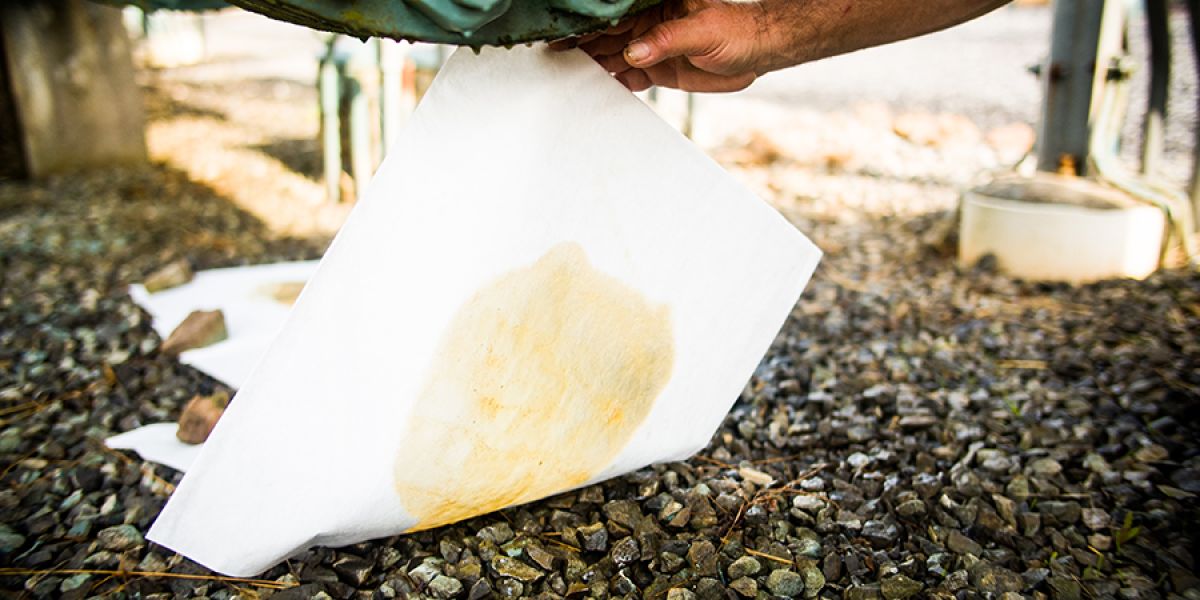 Oil Breaks Through White Spill Sheets