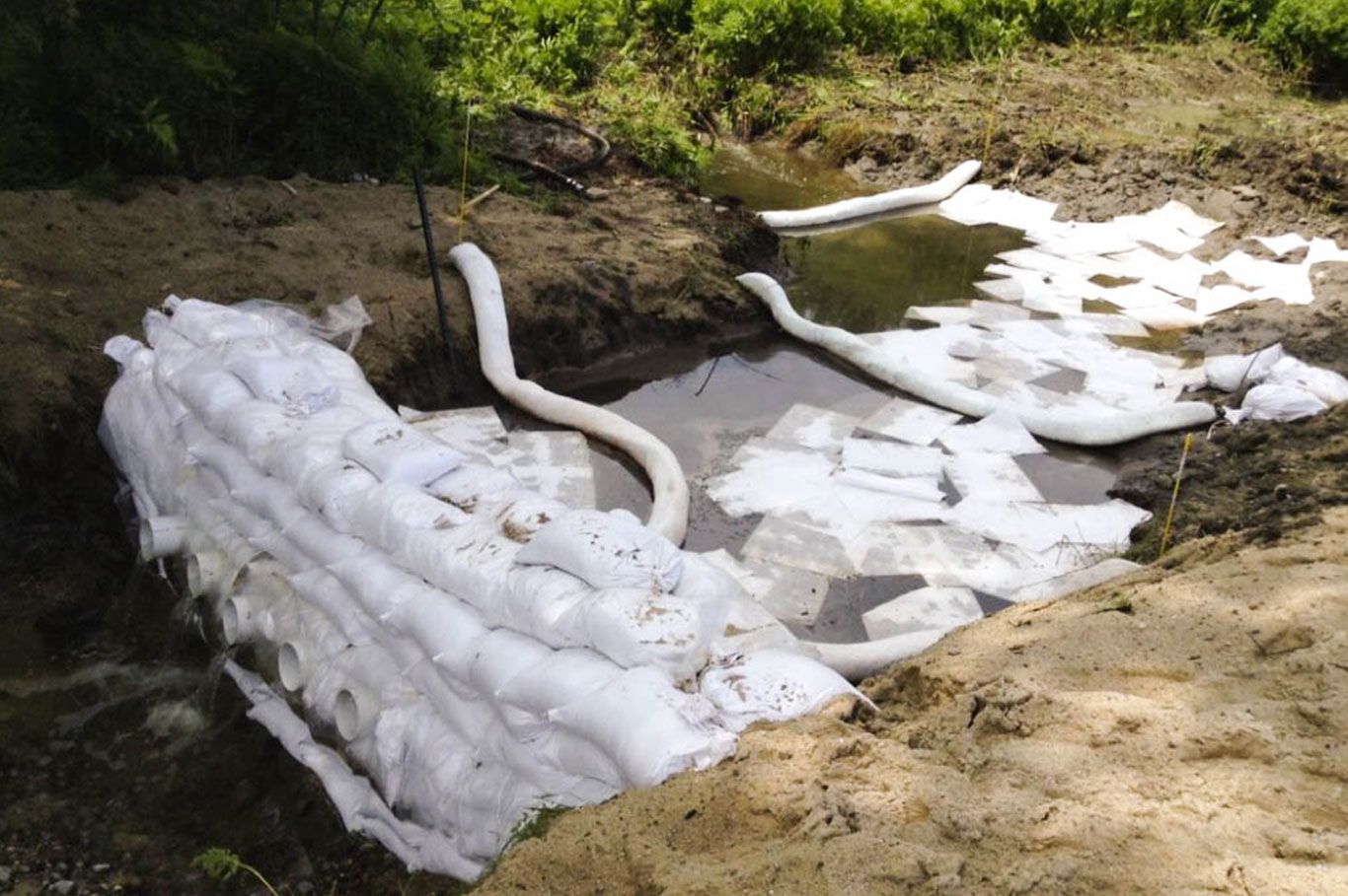 use oil spill dams instead of sandbagging